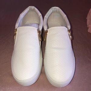 White slip on sneaker with zipper detail